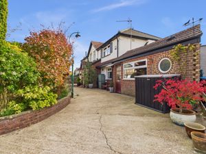 FRONT ASPECT & DRIVEWAY- click for photo gallery
